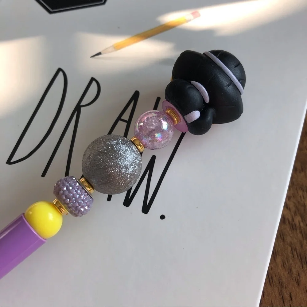 Disney Doorables: Aladdin: Princess Jasmine in purple dress handmade beaded pen